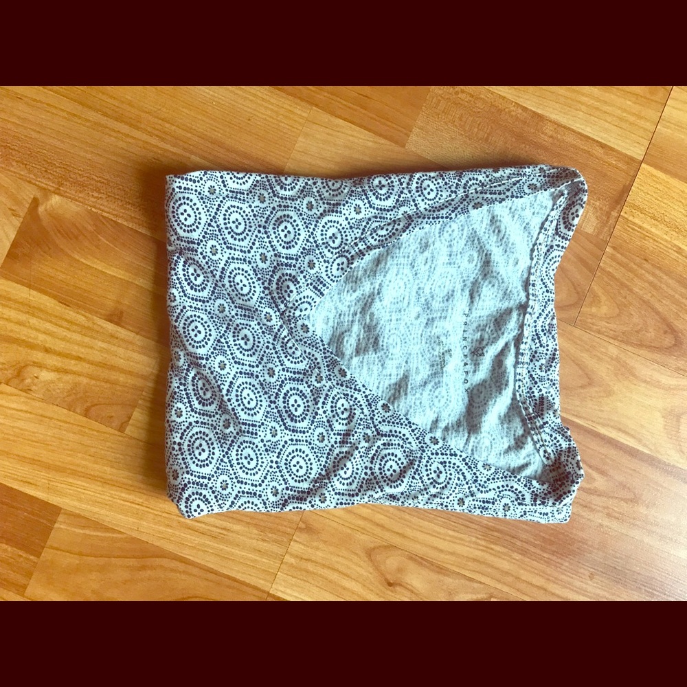 Navy blue & white patterned v neck.